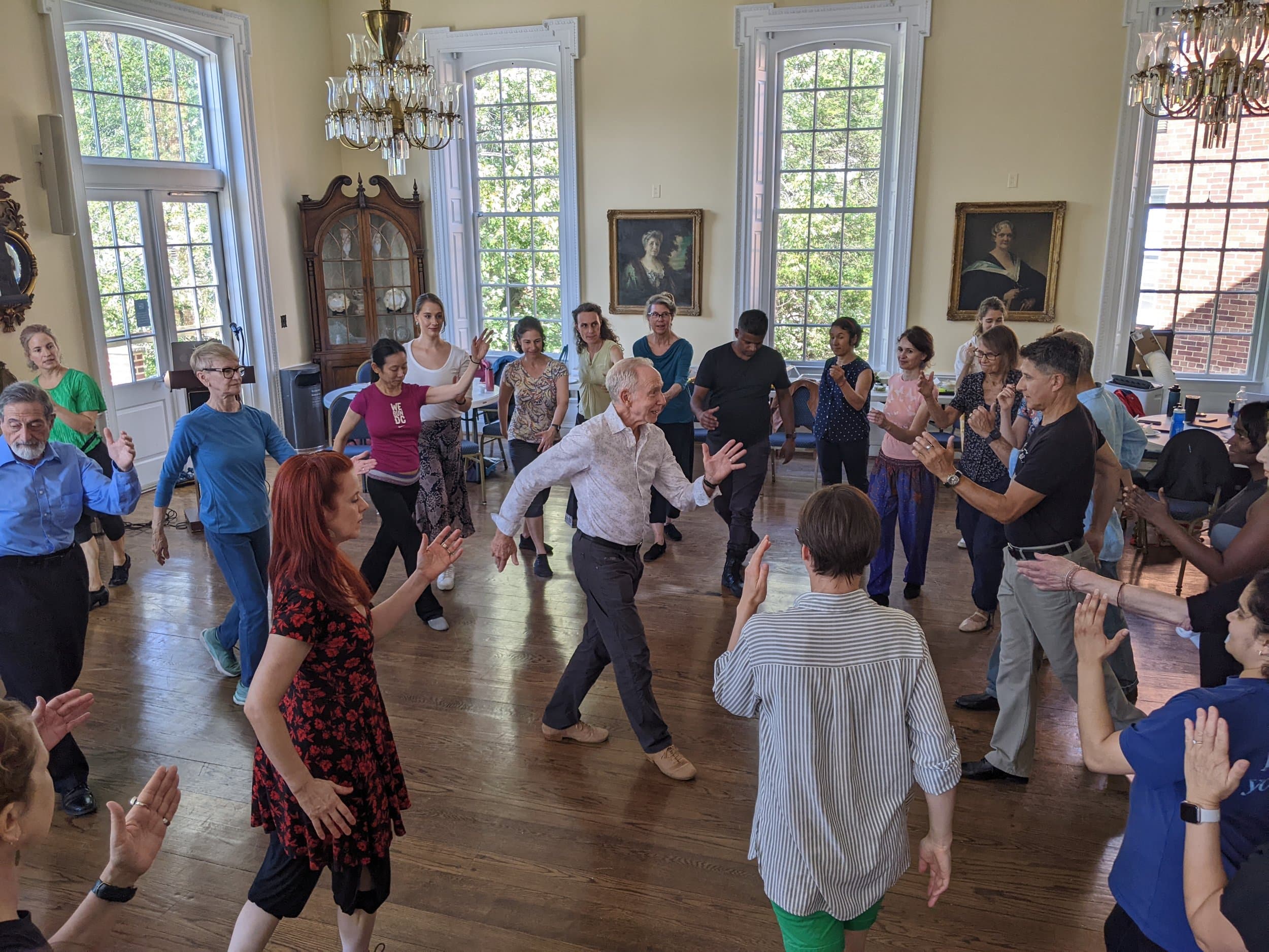 Older adults dancing tango together at a Tango Mercurio outreach session